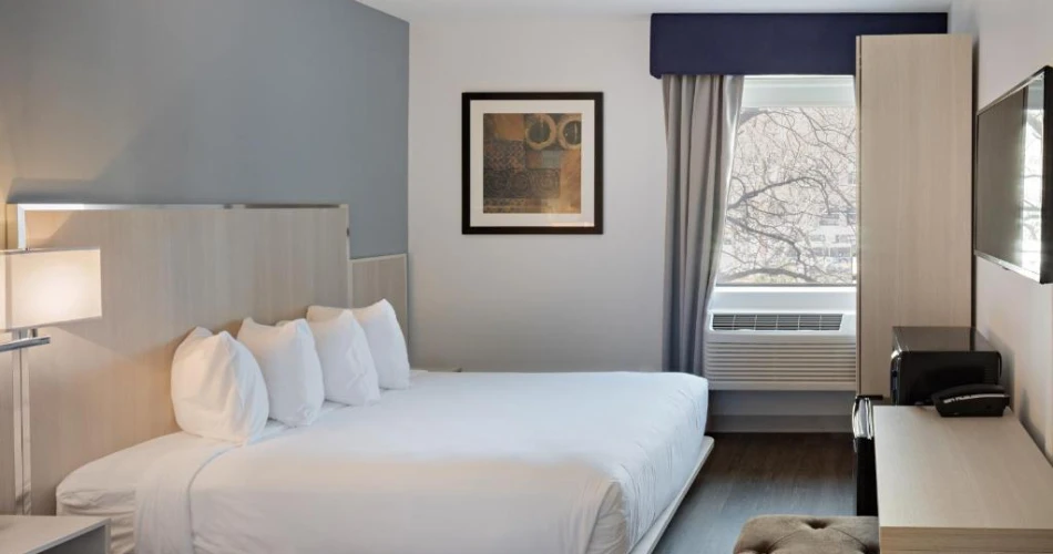 Plug In & Check In: Hotels Near NYU with Electric Vehicle Stations