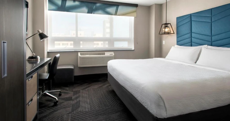 Plug In & Check In: Hotels Near NYU with Electric Vehicle Stations
